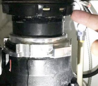 garbage disposal leaking from bottom
