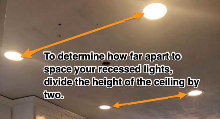 How far recessed light from cabinet