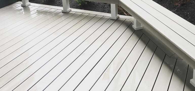 stamped concrete vs trex deck cost